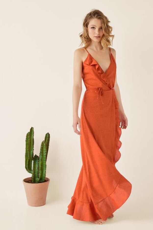 Vestido de canalé en tono naranja de las rebajas de Women'Secret (23,99 euros).