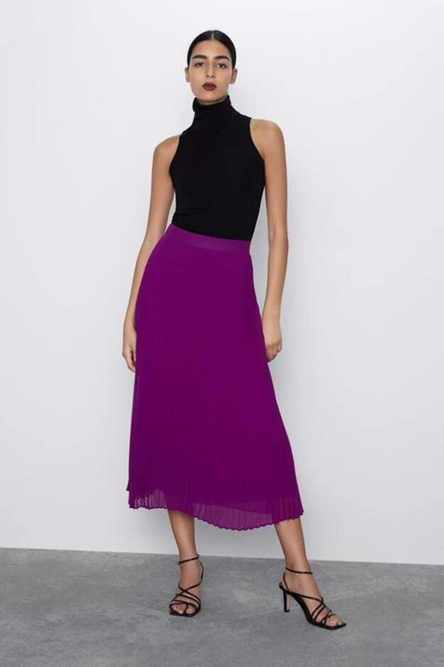Es barato Hollywood Sabroso Zara lanza una nueva falda midi plisada en un color que no nos puede gustar  más | Mujer Hoy