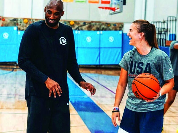 Con Kobe Bryant durante un entrenamiento.