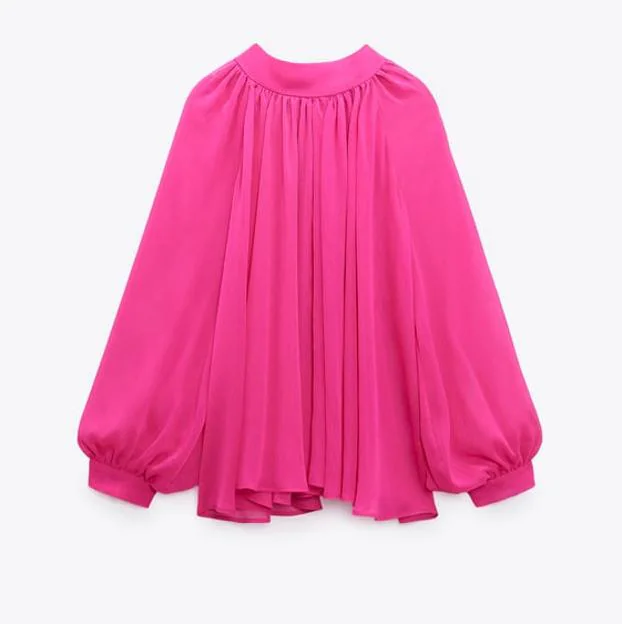 La blusa de Zara rosa.