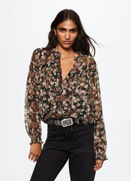 Blusa semitransparente con floral print