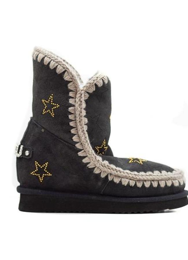 Botas con pelo forradas negras de MOU, 225,99 euros.