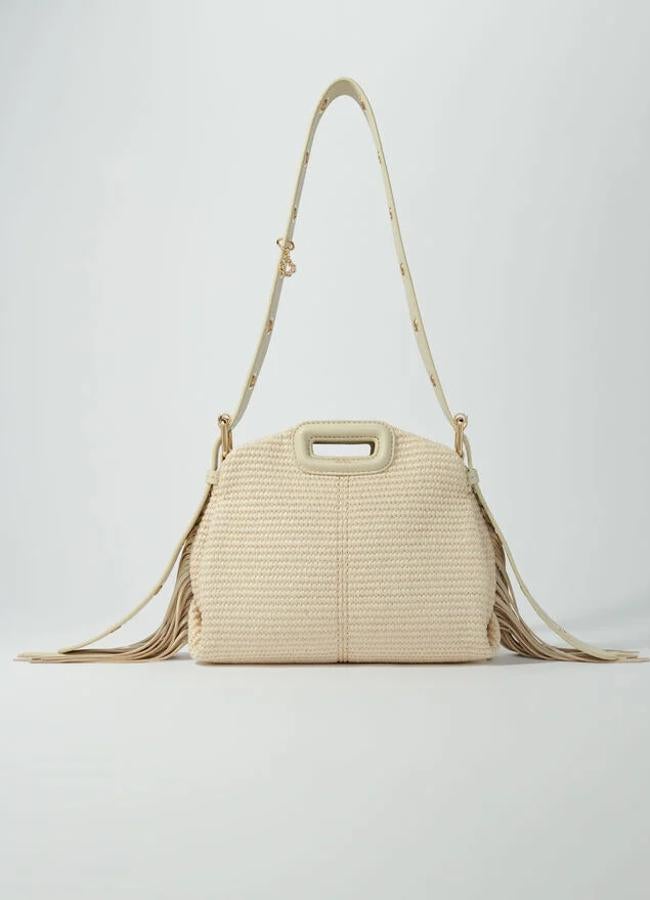 Bolso Miss M en rafia de Maje (225 euros).