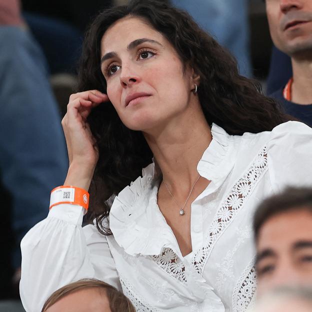 Xisca Perelló viendo a Rafa Nadal en su último partido.