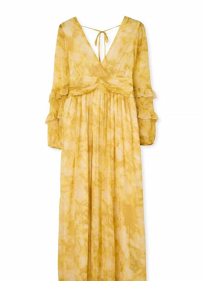Vestido estampado amarillo, de NA-KD, 23,68 euros.