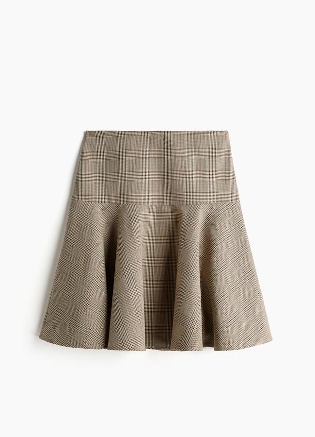 Falda de cuadros evasé de H&M, 35,99 euros.